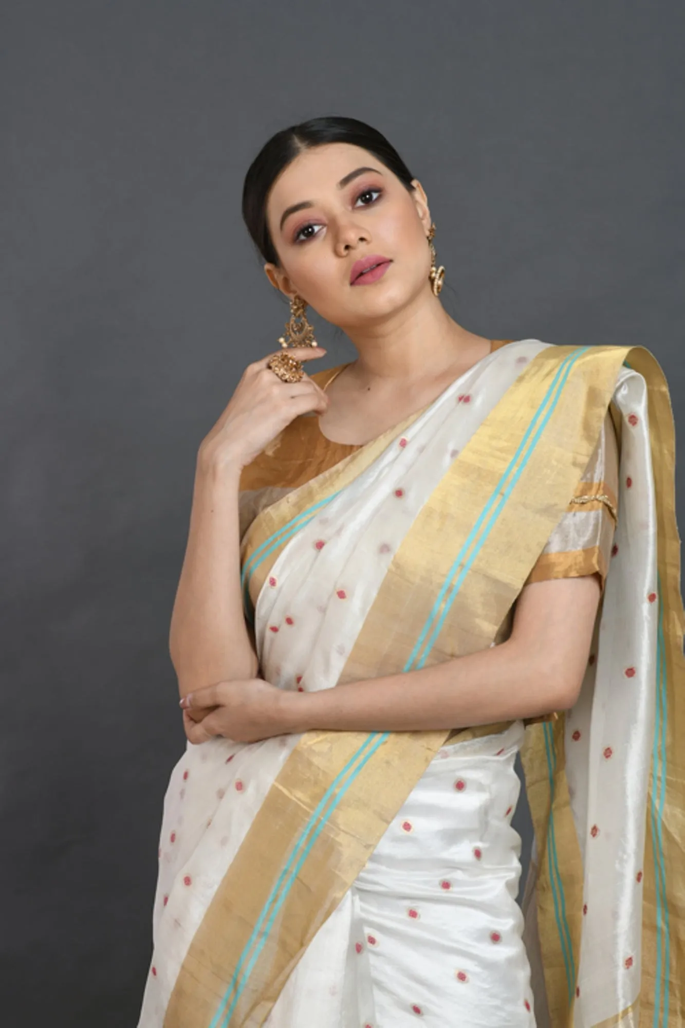 White silk saree with red buties
