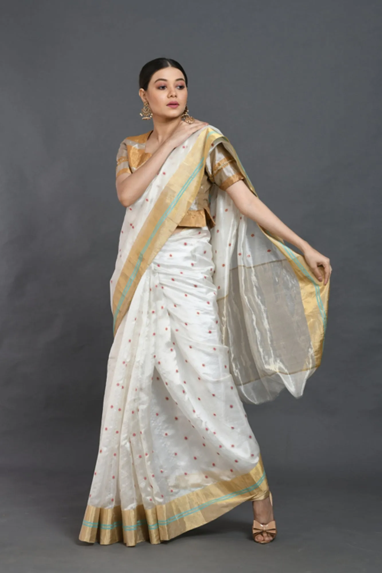 White silk saree with red buties