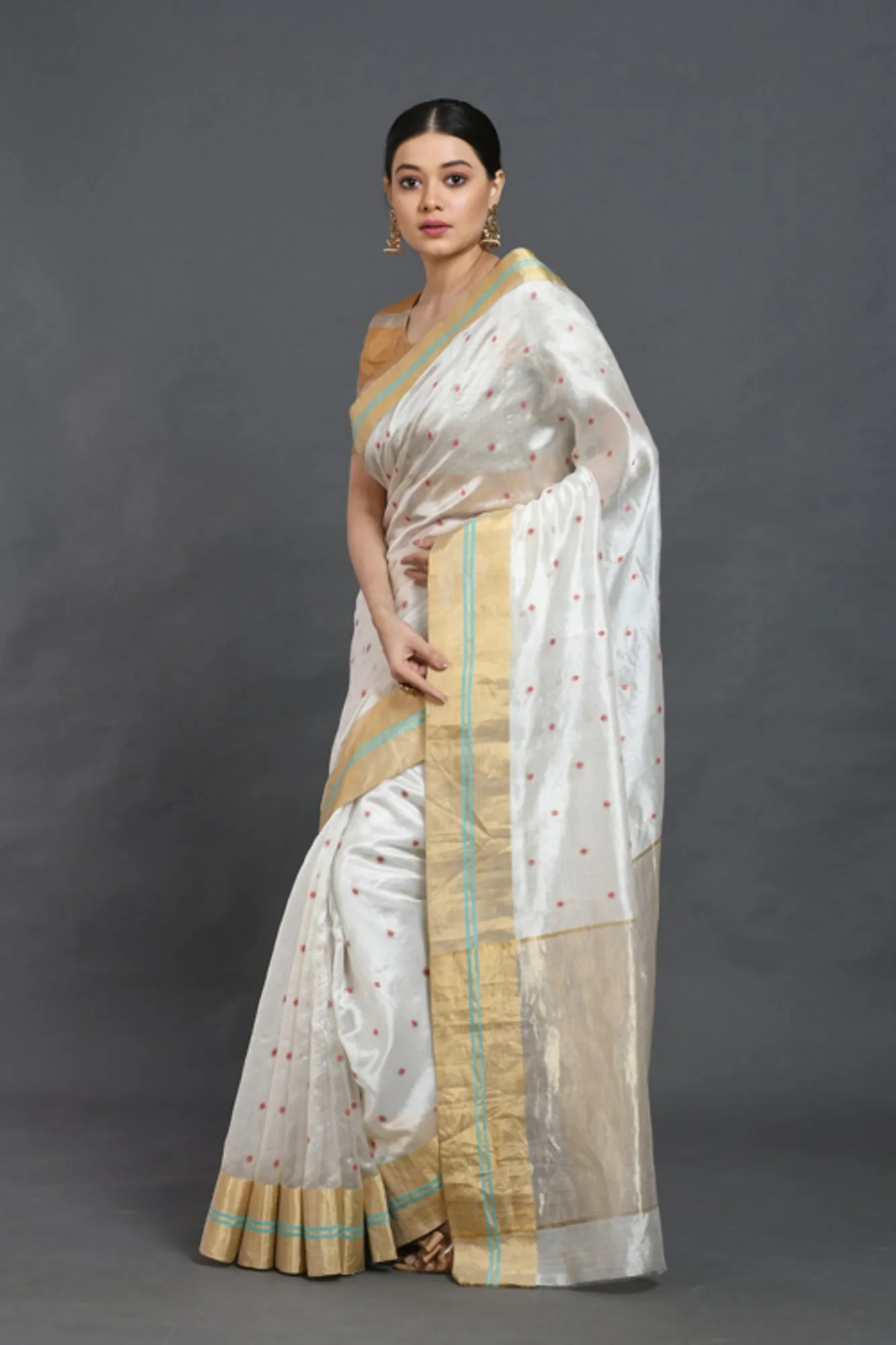 White silk saree with red buties