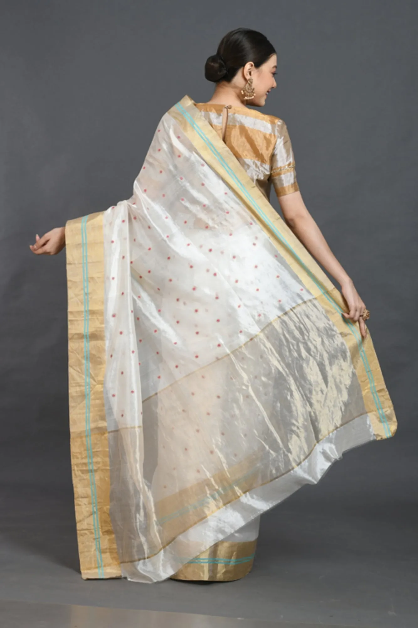 White silk saree with red buties